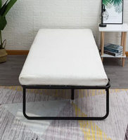 Cadre d'hôtel simple et pliable, lit en métal, confortable et de haute qualité, de couleur noir, à bas prix