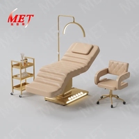 Table de massage moderne en cuir blanc avec base en acier inoxydable doré, lit de salon électrique de luxe à 3 moteurs avec commande au pied