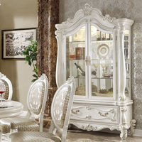 Ensemble de salle à manger de luxe en bois sculpté blanc royal européen, table ronde, chaises en cuir, vitrine de luxe