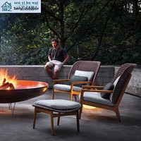 Fauteuil à bascule individuel haut de gamme en teck, mobile, avec repose-pieds en rotin, pour extérieur, style nordique, idéal pour villa, jardin, cour et salon
