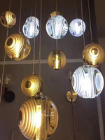 Lustre boule de verre romantique en spirale à plusieurs têtes Suspension de plafond réglable pour escalier Convient pour le salon de l'hôtel