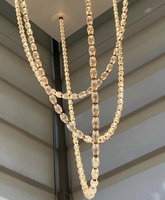 Projet personnalisé Hôtel Salon Escalier Lampe suspendue à LED Longue chaîne de luxe Lustre en métal et cristal Suspension