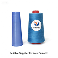 Fil à coudre 100% polyester haute ténacité ignifuge teinté 60/2 40/2 pour machine à coudre industrielle surjeteuse pour vêtements