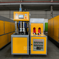 Toptan Yarı Otomatik Fabrika Çıkışı 2 Bölmeli 2L 1000BPH Mitsubishi PLC Enerji Tasarruflu PET Şişirme Makinesi