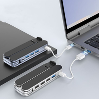 Nouveau support pour ordinateur portable pliable en aluminium Xowo réglable avec hub 3 USB haute vitesse 3.0 rotatif et 2 ports de charge Type-C