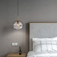 Lampe suspendue de forme circulaire, design nordique moderne, disponible en gris ou en bronze, création de designer, luminaire décoratif d'intérieur, idéal pour une salle à manger ou une chambre à coucher