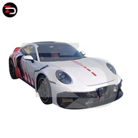 Pare-chocs avant, garde-boue arrière, jupe latérale, ailes de garde-boue de style fusée B900 en carbone sec de haute qualité pour Carrera S 4S 992.1