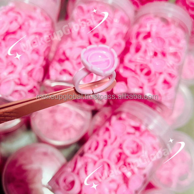 แหวนกาวพร้อมส่วนตัดกับแหนบในกล่องพลาสติก