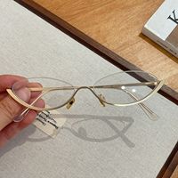 Montures optiques tendance pour femmes, lunettes anti-lumière bleue pour myopie, montures de lunettes en métal haut de gamme, ovales rétro, semi-cerclées