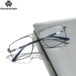 إطارات نظارات بصرية لرجال الأعمال بإطار معدني ذو مفصلات للربيع لعام 2024 إطارات نظارات بصرية غطاء نظارات مانع للضوء باللون الأزرق