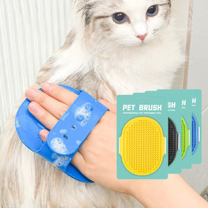 แปรงอาบน้ำสำหรับสัตว์เลี้ยงพร้อมขนแปรง TPR แบบอ่อนโยนสำหรับทำความสะอาดและกำจัดขนได้แบบสากล - Product Image 1