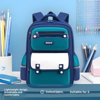 Sac à dos scolaire unisexe pour élèves du primaire (3e-6e années) en cuir synthétique microfibre respirant ultra-léger avec bretelles courbées en nylon