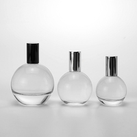A-Best Flacon de parfum rond en verre haut de gamme avec pulvérisateur et impression sérigraphique disponible en tailles 30ml/50ml/100ml