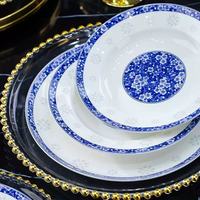 Service de table en porcelaine bleue et blanche avec motif ajouré fleur de prunier, vaisselle en céramique craquelée pour banquets à domicile