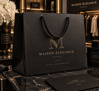 Sac cadeau de luxe noir en papier couché recyclable avec logo gaufré et poignée en corde de coton – Emballage cadeau haut de gamme pour vêtements