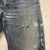 Pantalon de jean classique délavé à l'acide OEM éclaboussures de peinture déchirée par des éclaboussures Streetwear à moustaches Broderie vintage Prix compétitif