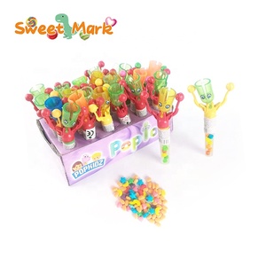 Divertente Giocattolo a Forma di Omino su Dondolo con Campanello e Caramelle in Confezione all'Ingrosso - Product Image 1