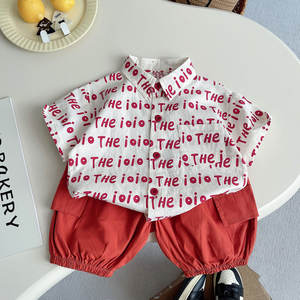 Nouvel ensemble 2 pièces pour garçon 2026 : <span class=keywords><strong>chemise</strong></span> blanche à manches courtes avec imprimé lettres et short <span class=keywords><strong>orange</strong></span> - Product Image 3