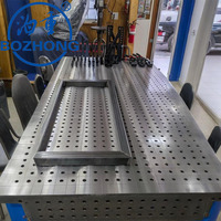 Table de soudage flexible 3D en fonte D28 avec grille perforée, surface de précision rectifiée, fixation modulaire robuste