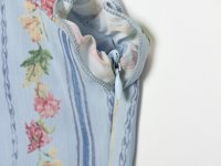 Nouvelle robe mini décontractée pour femme 2026, imprimé floral, style rétro chic, sans manches, coupe ajustée.