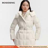 Vente en gros de manteaux longs en duvet pour femmes, couleur beige, avec ceinture, capuche en fausse fourrure, veste matelassée