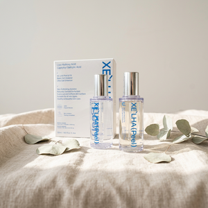 1. XE LHA เฟเชียล พีลลิ่ง ลิควิด เอ็กซ์โฟลิเอเตอร์ สำหรับทุกสภาพผิว - Product Image 1