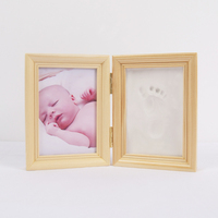 Nouveau kit d'empreintes de mains de bébé 2025 en vente chaude, cadre photo en bois avec argile pour empreintes de mains, logo personnalisé, imperméable, nouvelle création de souvenirs de bébé