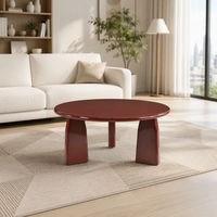 Table basse moderne italienne ronde en MDF brillant, écologique et durable, avec pieds en bois, pour salon ou villa.