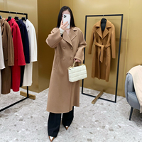 Manteau long en cachemire et laine double face pour femme, style mode automne-hiver 2026, coupe ample et oversize, double boutonnage, couleur camel