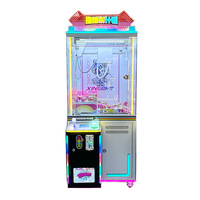 Nouvelle mini machine à griffes à monnayeur en bois et métal, avec fonction musicale, jeu de poupées, lampe LED et système de poussée, pour l'amusement des enfants, SDK
