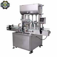 Machine de remplissage automatique multi-têtes pour liquides et pâtes, idéale pour jus, boissons, sauce tomate, cosmétiques