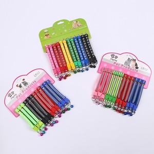 Collares de gato reflectantes ajustables con patrón de pata de hueso barato al por mayor con campanas ID 12 unids/set <span class=keywords><strong>Collar</strong></span> de gatos pequeños - Product Image 1