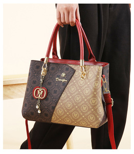 Sac à main élégant en cuir PU marron à monogramme avec poignée supérieure et bandoulière amovible pour le <span class=keywords><strong>travail</strong></span> et les sorties décontractées - Product Image 1