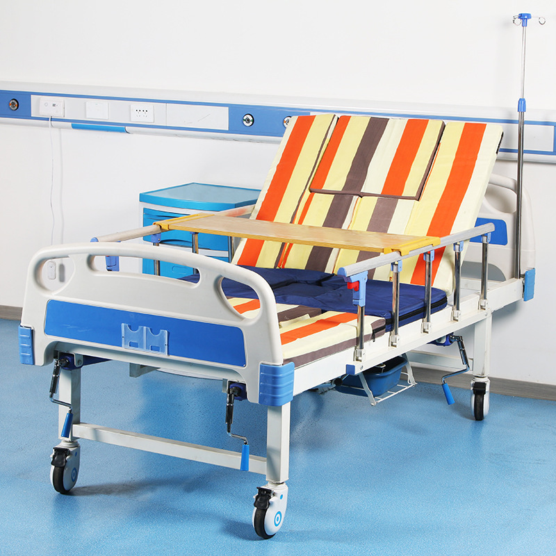 Manual medium-curved nursing bed