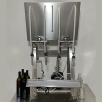 Machine de remplissage semi-automatique à 4 têtes pour vin, whisky, eau pure, jus, liqueur et autres liquides en bouteilles PET