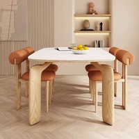 Chaises dinantes de luxe modernes de pièce en bois solide noire nordique noire en cuir française pour la table dinante