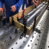 Nouvelle table de soudage flexible 3D YAHANDA avec grille de positionnement de précision D16 D28 pour la fabrication de remorques et de semi-remorques