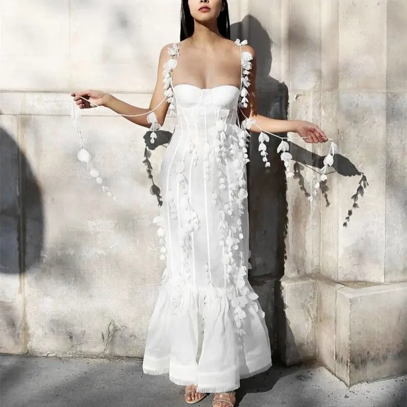 白い花のドレスのファッションデザインセンス女性のタッセルホルターストラップバンケットフィッシュテールドレス