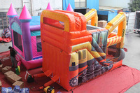 Structure gonflable commerciale d'extérieur : château de saut, toboggan, combo camion-pelle et château d'ingénieur