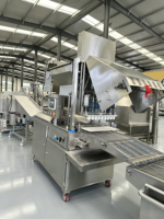 Ligne de production de nuggets de poulet de style KFC McDonald, ligne de formage automatique, d'enrobage, de friture, de congélation IQF et d'emballage