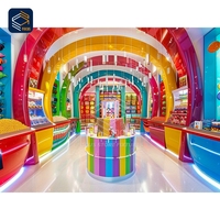 Conception d'aménagement de magasin commercial évolutive avec éclairage LED pour l'intérieur, conception de magasin de bonbons pour enfants
