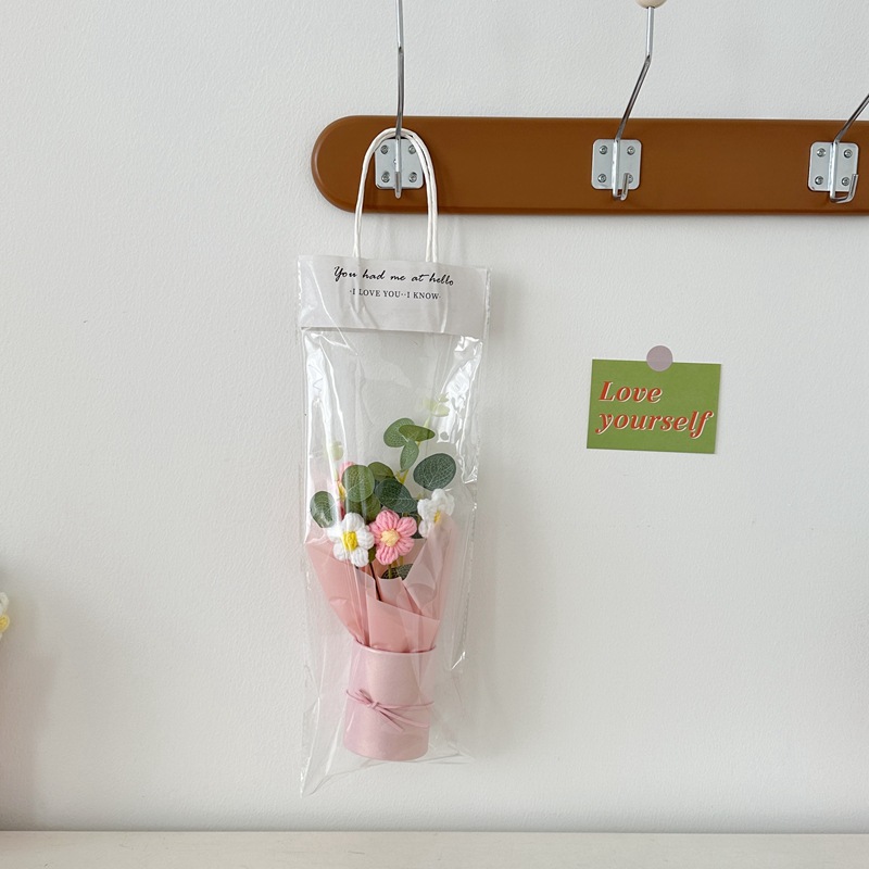 Rose avec sac cadeau transparent