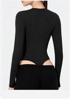 Combinaison de yoga une pièce haut de gamme pour femme, coupe ajustée, manches longues, pour le sport et le fitness, motif uni