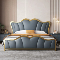 Lit moderne de luxe design pour la maison, élégant lit en cuir rehaussé avec bord en acier, ensemble de lit King populaire haut de gamme pour hôtel