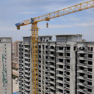 מנוף צריח שטוח דגם דאהן QTZ250 דגם 7025-12T עם בקר PLC ומנוע, כושר הרמה 12 טון, טווח 70 מטר, מומנט הרמה 250 טון.מטר לבנייה - Product Image 2