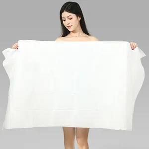 डिस्पोजेबल स्नान तौलिए व्यक्तिगत रूप से पैक किए गए डिस्पोजेबल संपीड़ित तौलिए सूखे गाढ़े और बड़े आकार के सूती यात्रा उत्पाद
