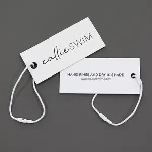 Custom Swing Hang Tags Merknaam Luxe Metalen Oogje Kleding Tag Pin Reliëf Uv Print Kartonnen Label Tag