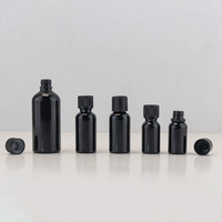Bouteille d'huile essentielle en verre noir brillant de 5 ml, 10 ml, 15 ml, 20 ml, 30 ml, 50 ml, 100 ml avec col à vis et bouchon en plastique noir