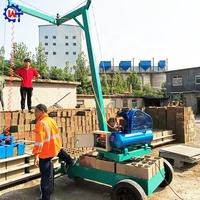Petite machine manuelle de collecte et d'empilage de blocs de béton