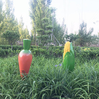 Sculptures réalistes de fruits et légumes en fibre de verre Statue de cacahuètes et de maïs en résine personnalisée en grande taille pour le jardin